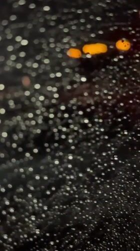 Nighttime rainfall documented on window in Huejotzingo, Mexico