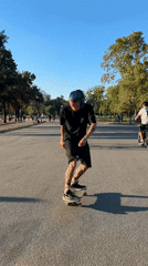 Skateboarder practices tricks at Buenos Aires park Saturday evening