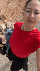 Woman films selfie video while walking Podgorica street