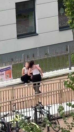 Afternoon in Khimki: street scenes and a wrestling championship billboard