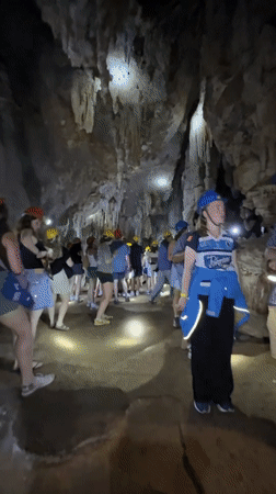 Helmet-on caving tour through Khao Phang's limestone caverns