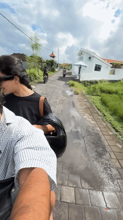 Couple enjoys moped ride and breakfast in North Kuta