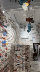 Barcelona souvenir shop displays European destination signs and magnets