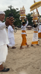 Traditional Balinese beach procession observed in Kuta Selatan