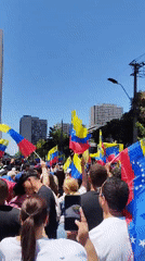 Venezuelan flag demonstration draws crowds in Santiago, Chile