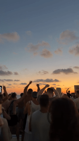Sunset beach crowd and a romantic dinner in Tel Aviv