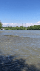 Muddy river views near Yelizovo with a volcano looming behind