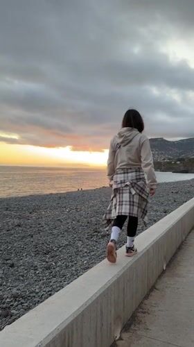 Sunset gathering observed at Funchal rocky beach, Portugal