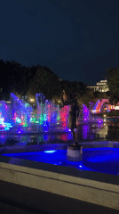 Colorful fountain displays illuminate Yerevan night with bronze sculptures