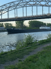 Barge "Nikolai Basov" transits canal under Dmitrov bridge
