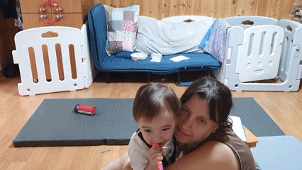 Mother and baby share quiet morning moments at home