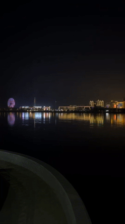 Nighttime scenes captured across Blagoveshchensk landmarks and waterfront