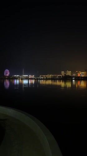 Nighttime scenes captured across Blagoveshchensk landmarks and waterfront