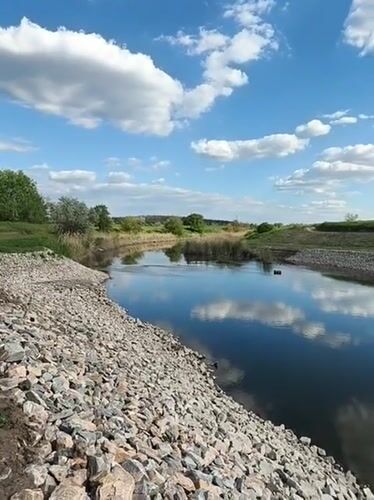 Peaceful riverside gathering documented in Kryvyi Rih, Ukraine