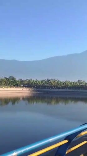 Sunny morning at Purwokerto's lakeside park and fairground
