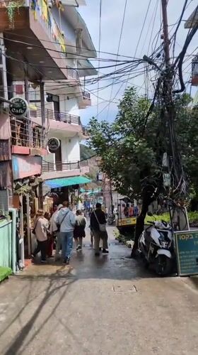 Morning street life documented in Bhagsu, India tourist town