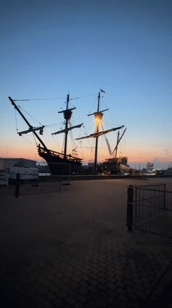 Golden Hinde replica docked at Great Yarmouth at dusk