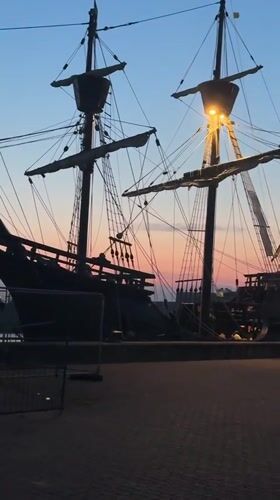 Golden Hinde replica docked at Great Yarmouth at dusk