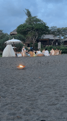 Beach gathering with fishing and dogs in Mengwi, Indonesia