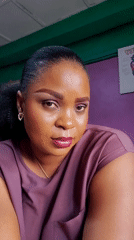Woman photographed in Nigerian classroom with anatomy materials