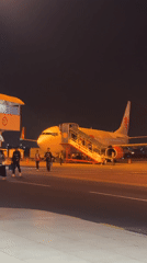 Routine passenger arrivals at Jakarta airport captured at night