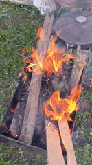Backyard fire pit burning captured in residential setting