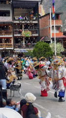 Street festival rolls through a mountain town near Machu Picchu