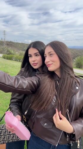 Two women take selfie near Veliko Tarnovo on cloudy day
