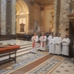 Religious ceremony with Christ statue procession at Buenos Aires Cathedral