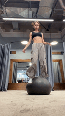 Woman exercises, rests in Krasnoyarsk fitness studio