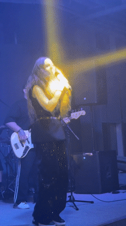 Female singer performs live with band in Krasnoyarsk