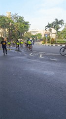 Early morning activity around Surabaya's golden monument