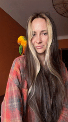 Woman and Bull Terrier share quiet moments in Khimki home