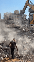 UN teams and excavators work through Gaza rubble in recovery operation