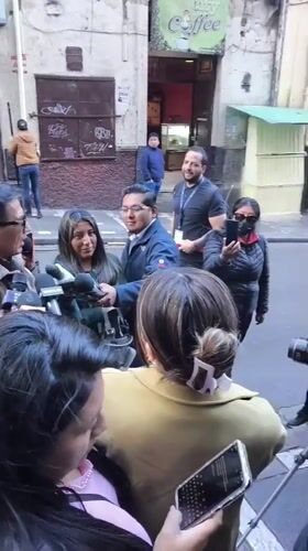 Media crews gather for interviews on La Paz streets