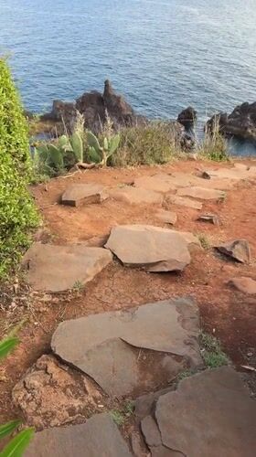 Coastal pathway and 30-year-old love lock documented in Funchal