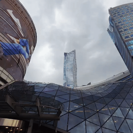 Modern Warsaw commercial district with glass dome documented
