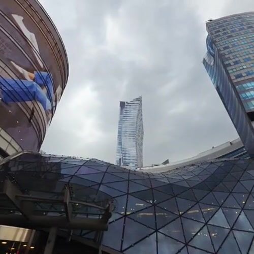 Modern Warsaw commercial district with glass dome documented