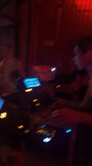Women DJ at red-lit venue in North Kuta