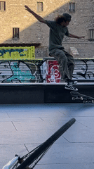 Man skateboarding in urban Barcelona setting