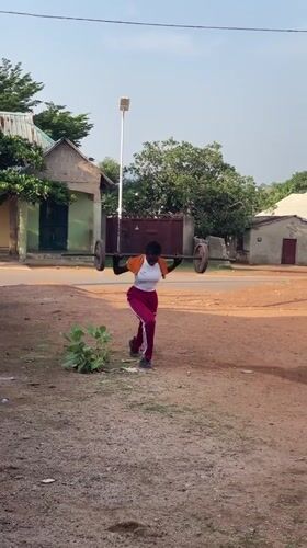 Morning fitness and yard work observed in rural Nigeria
