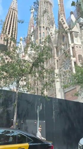 Street view pans up to Barcelona's iconic spired cathedral