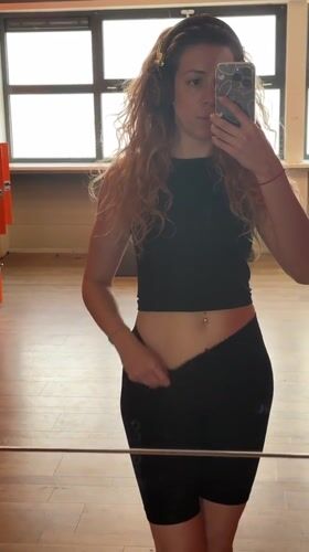 Woman documents gym workout session in Amsterdam