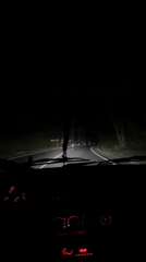 Nighttime drive captured on winding road in Sadovo, Bulgaria