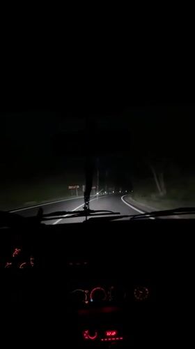 Nighttime drive captured on winding road in Sadovo, Bulgaria