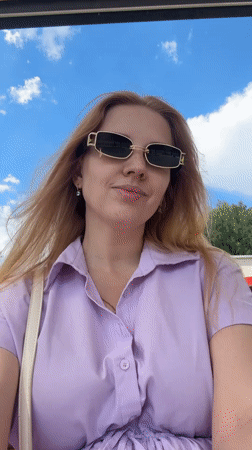 Woman and child captured in casual morning scenes around Yaroslavl