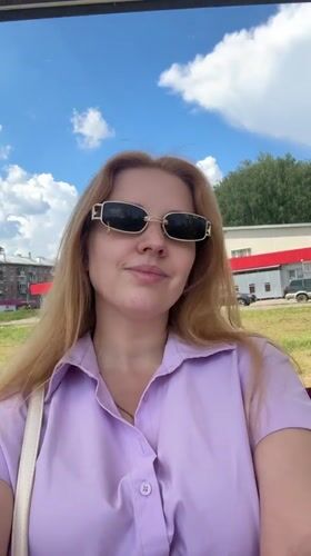 Woman and child captured in casual morning scenes around Yaroslavl