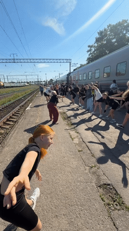 Youth group performs synchronized dance routine at Russian train station