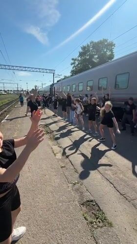Youth group performs synchronized dance routine at Russian train station