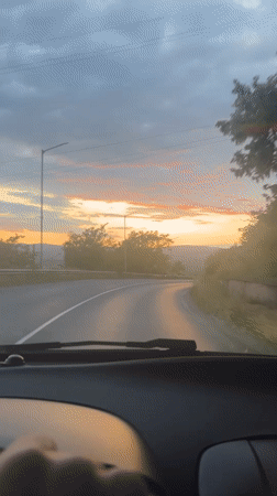 Evening drive documented through Blagoevgrad during vibrant sunset